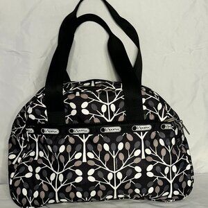 black and white Lesport sac over night bag
